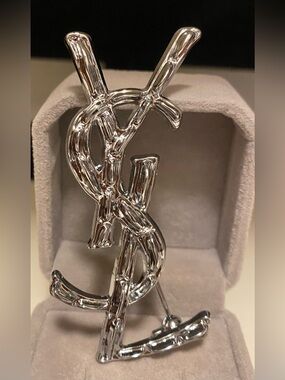 Yves Saint Laurent Dark Silver Tone Cassandre YSL Brooch Unisex